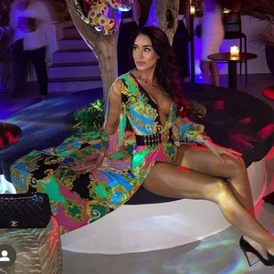 long with slit in the middle exposing private area (has a matching body suit